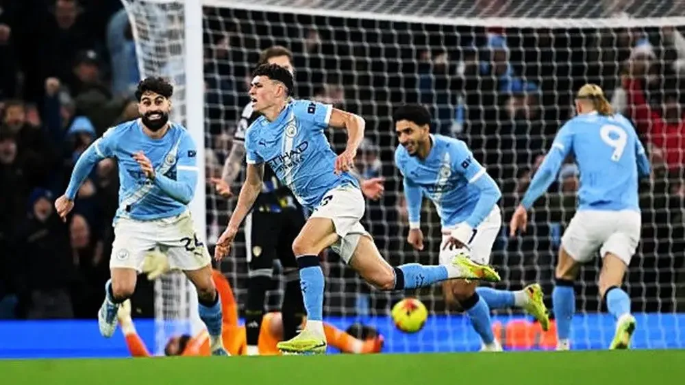 Foden hóa người hùng, Man City đánh bại Leeds trong cơn mưa bàn thắng - Ảnh 1.