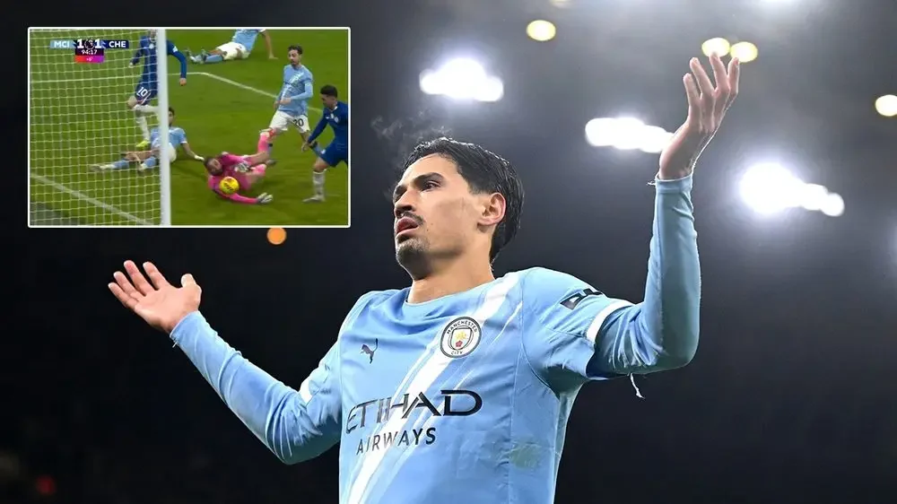 Mất điểm trước Chelsea ở phút bù giờ, Man City ngậm ngùi nhìn Arsenal bỏ cách 6 điểm - Ảnh 1.